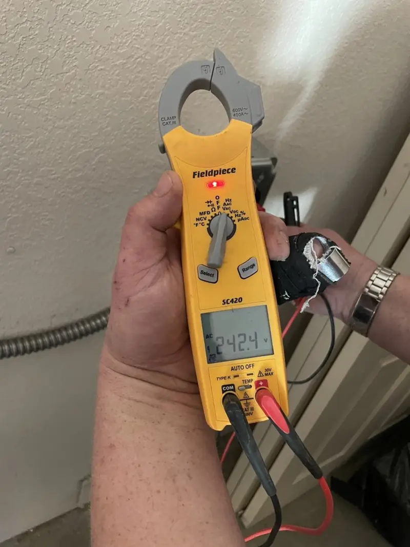 Voltage testing with clamp meter during Circuit Breaker Repair in Rosendale